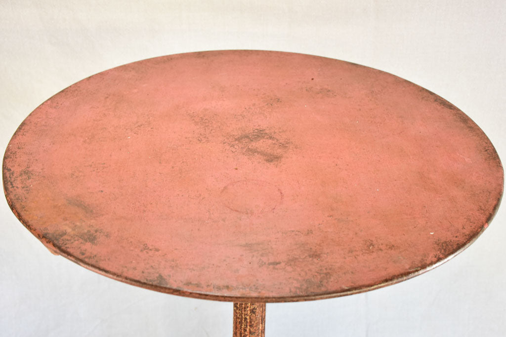 Nineteenth-century French garden table with salmon red patina