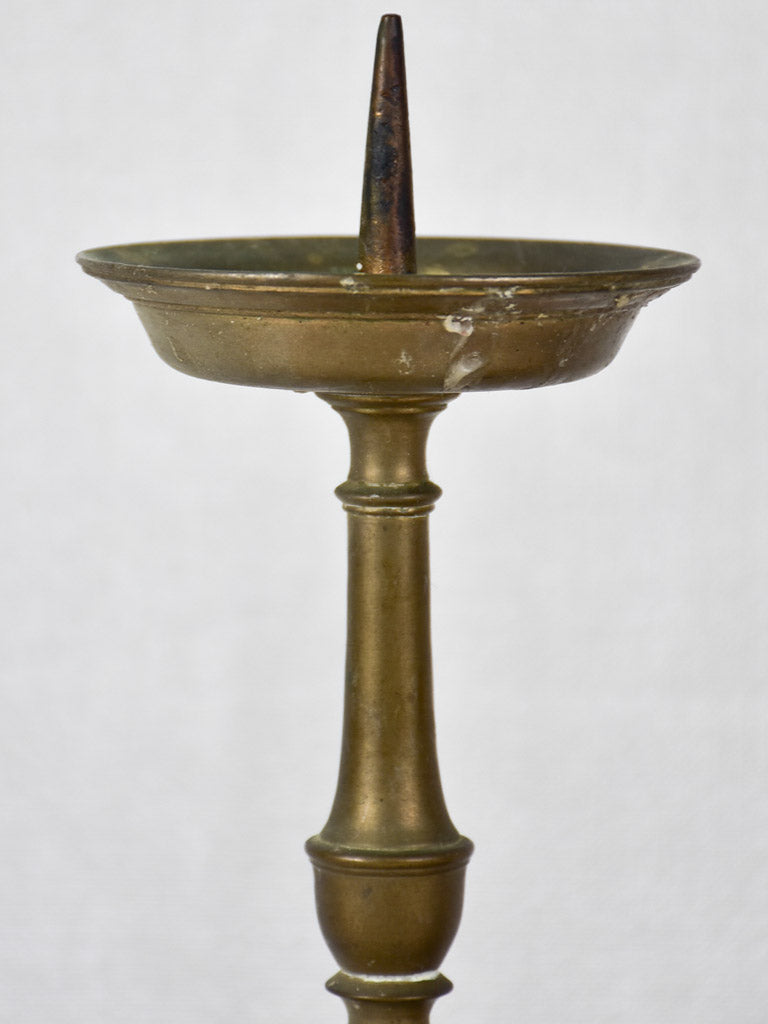 Rustic-style bronze candlesticks