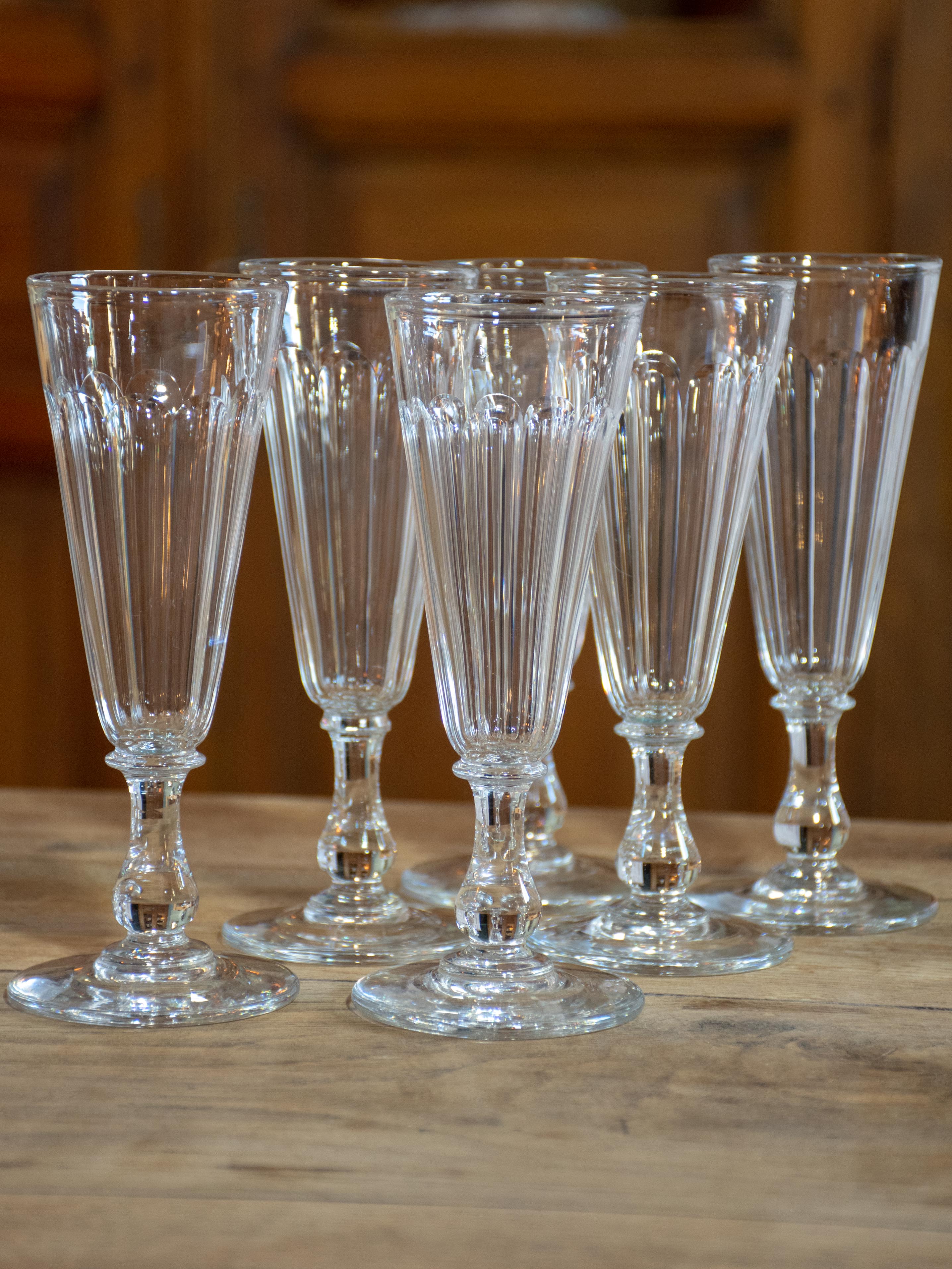 Six antique French Baccarat champagne flutes