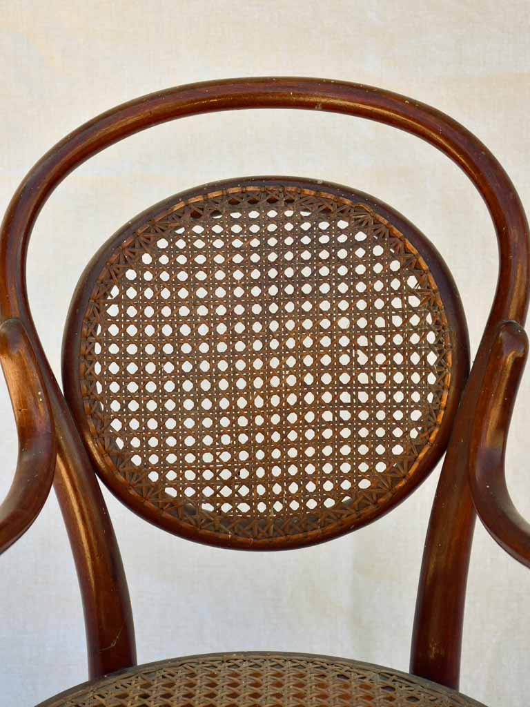 Antique French children's bentwood and cane armchair