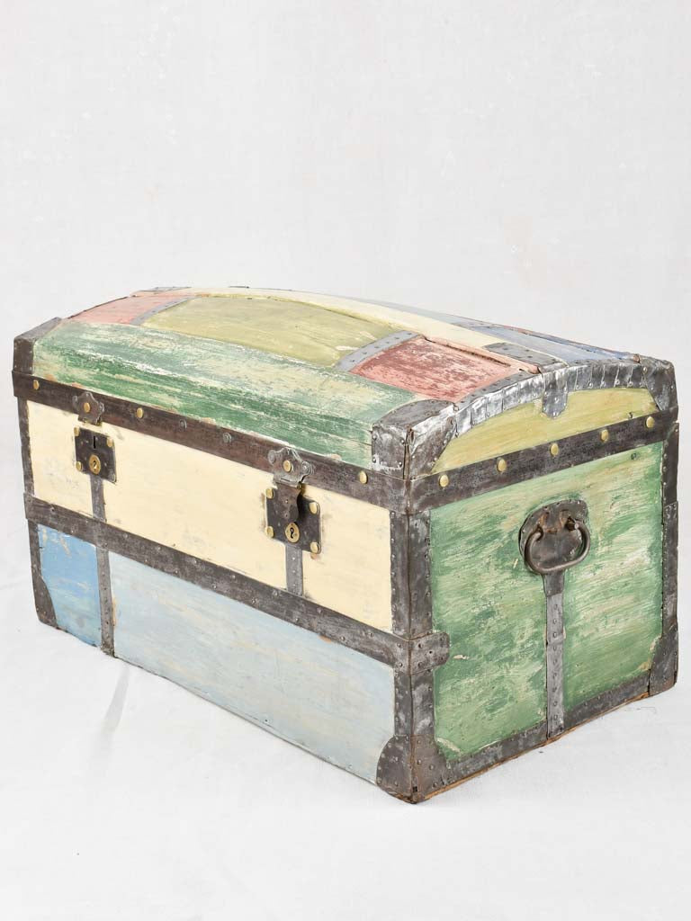 Antique multicolored poplar wood travel trunk