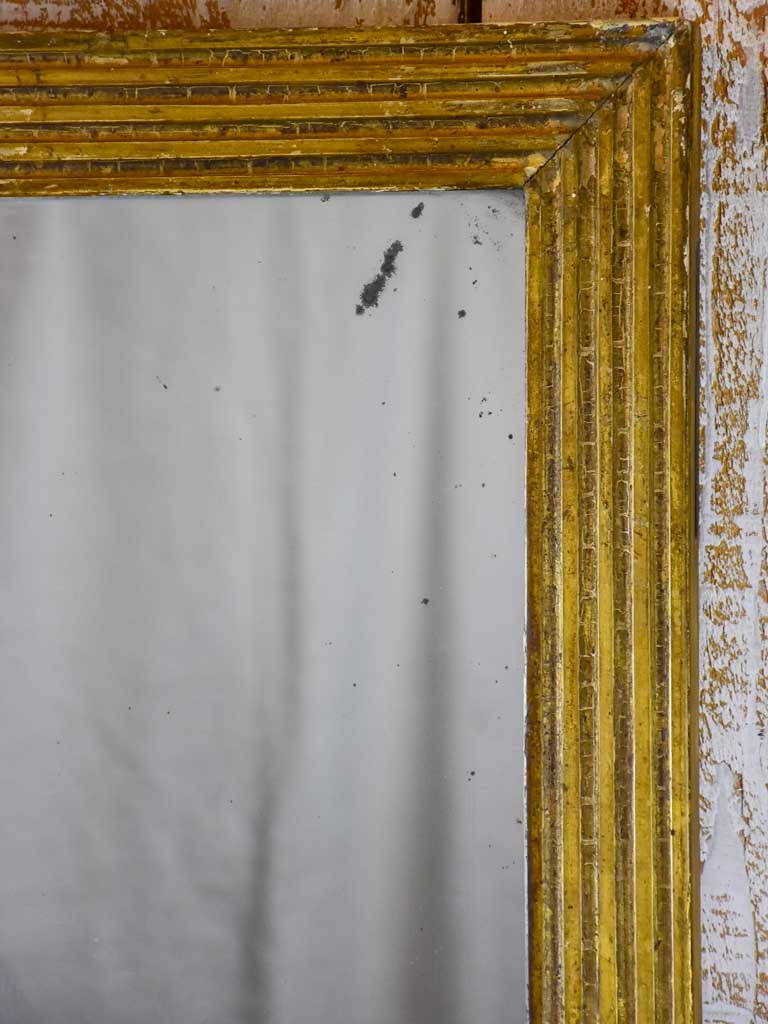 Small rectangular 18th Century Louis XVI mirror with gilded frame