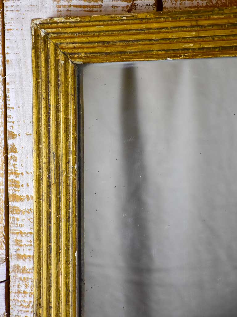 Small rectangular 18th Century Louis XVI mirror with gilded frame