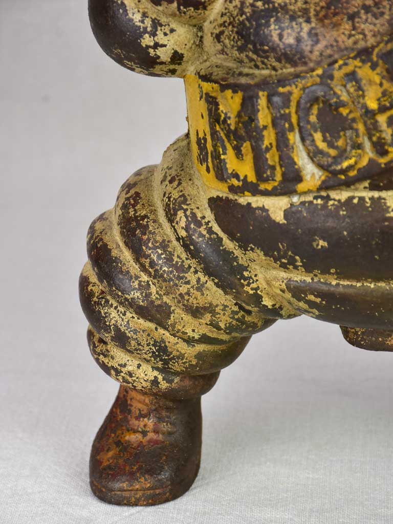 Early 20th century Michelin man, Bibendum from a large air compressor