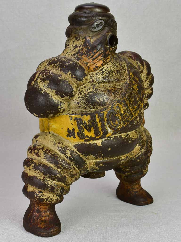 Early 20th century Michelin man, Bibendum from a large air compressor