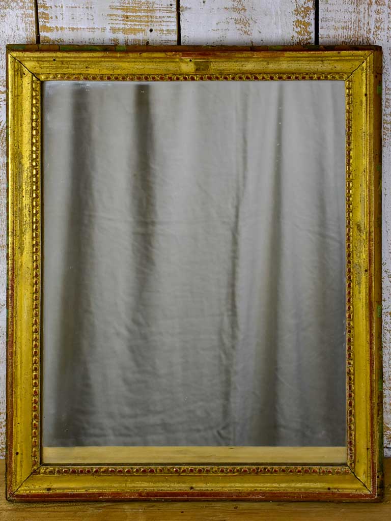 Small 18th Century Louis XVI mirror with gilded frame 24½" x 20½"