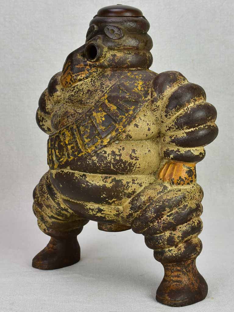 Early 20th century Michelin man, Bibendum from a large air compressor