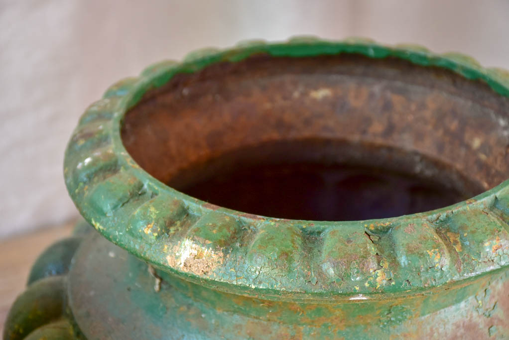 Pair of cast iron French antique garden urns with green patina