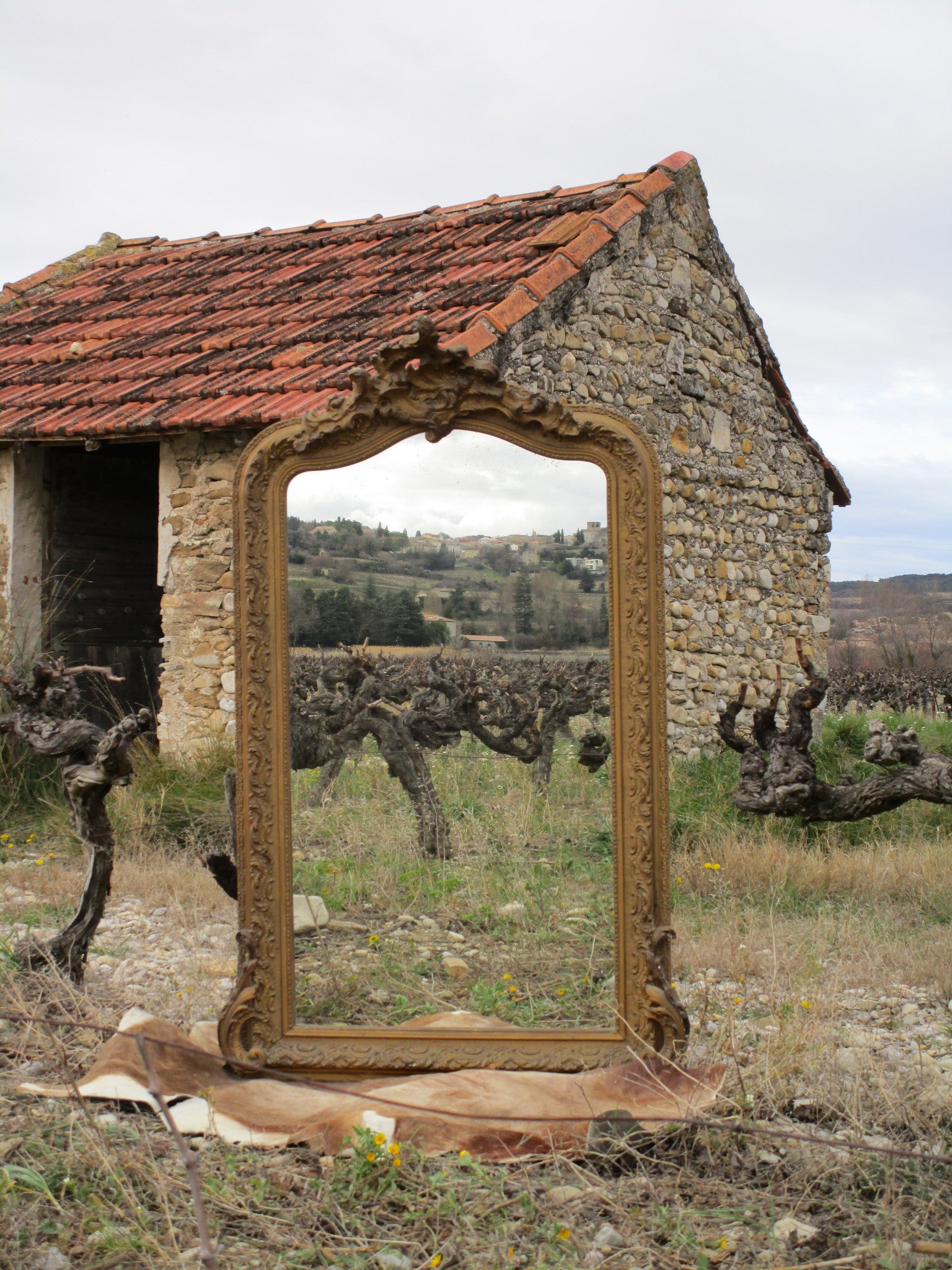 Louis XV style gilt mirror