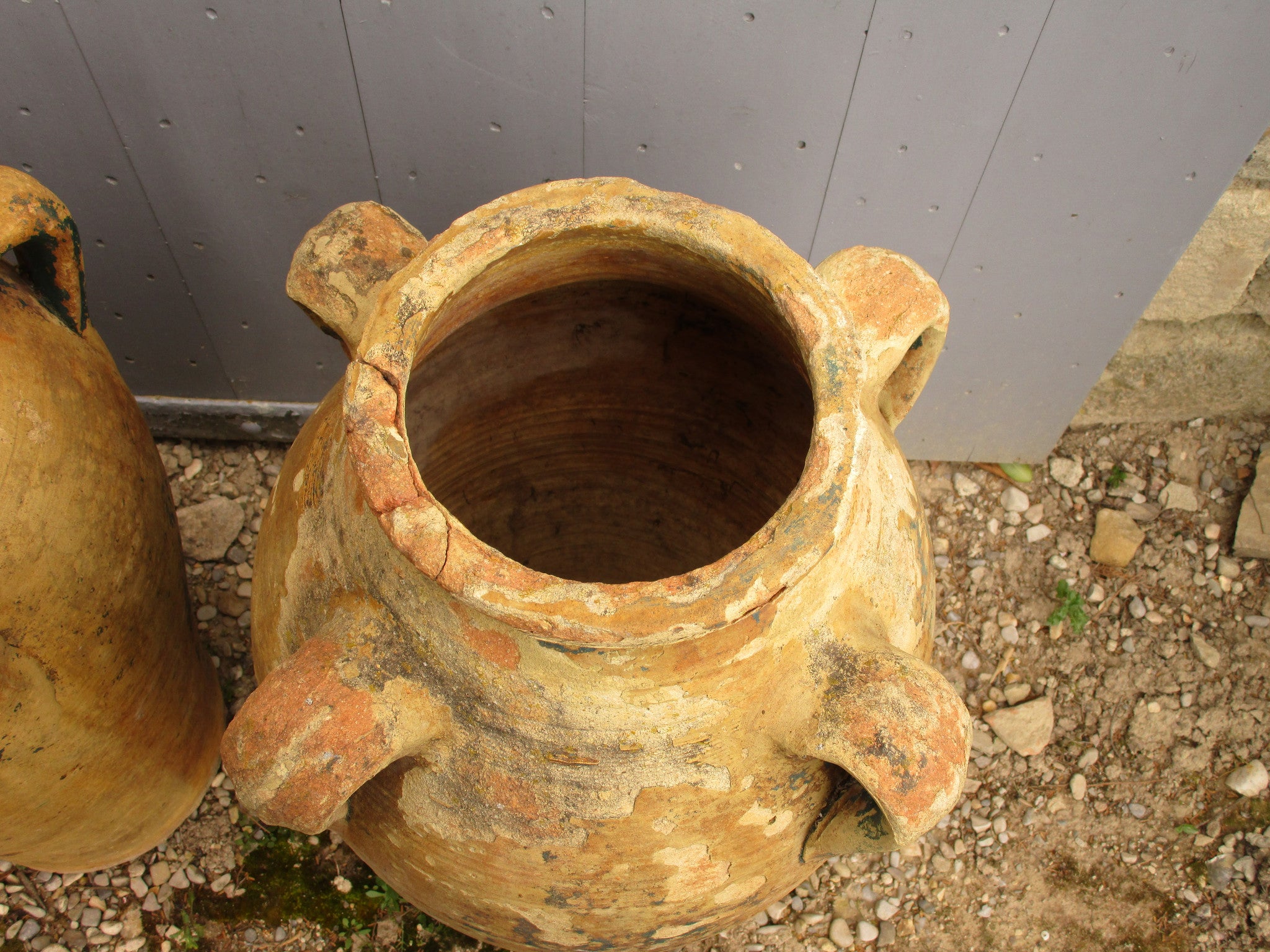 Detail pair of large french garden pots with natural patina rustic farmhouse garden