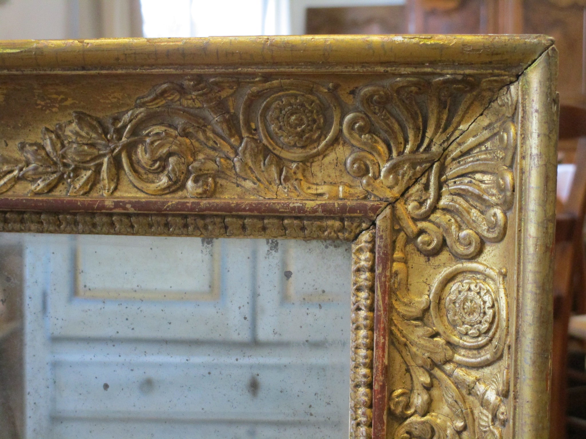 Frame detail of gilt wood mirror with original mercury glass 94cm