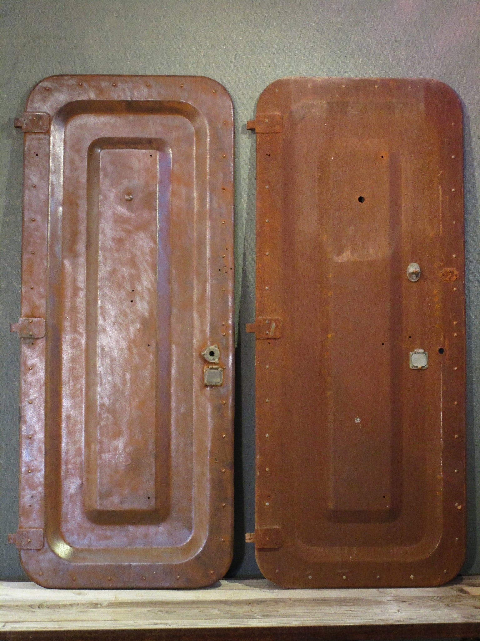 Pair of antique rustic metal boat doors