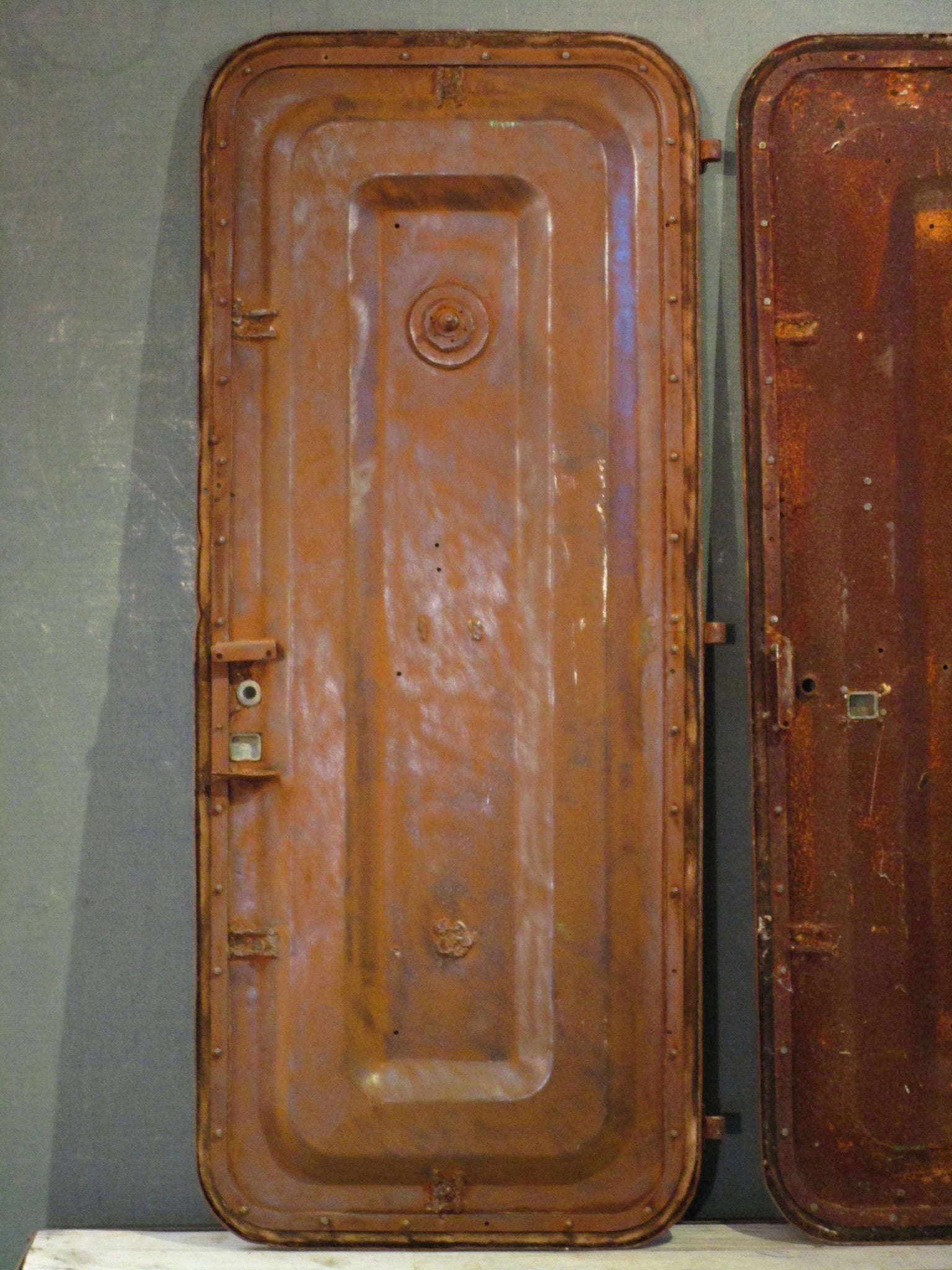 Pair of antique rustic metal boat doors