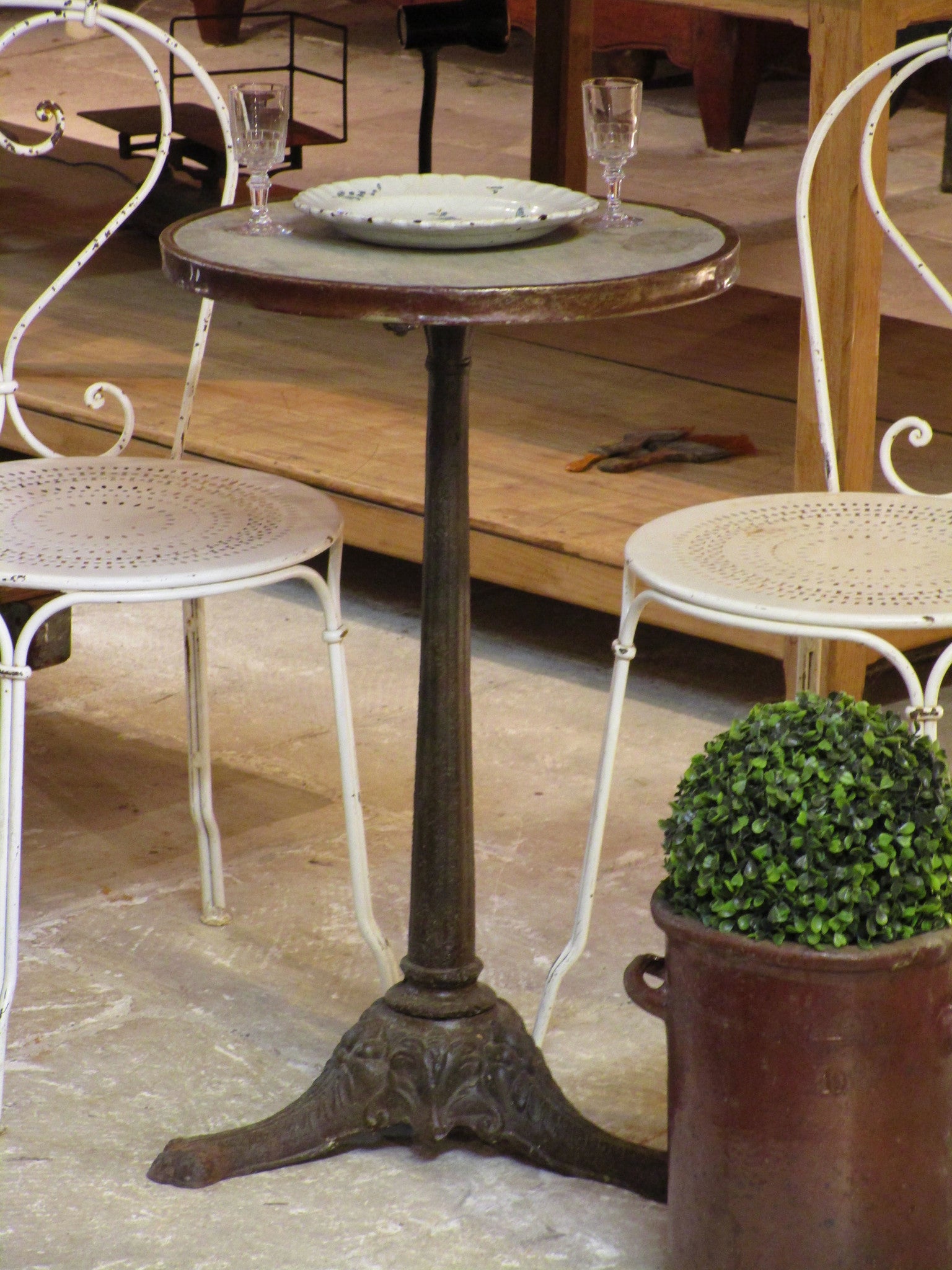 Round Parisian cafe marble top table