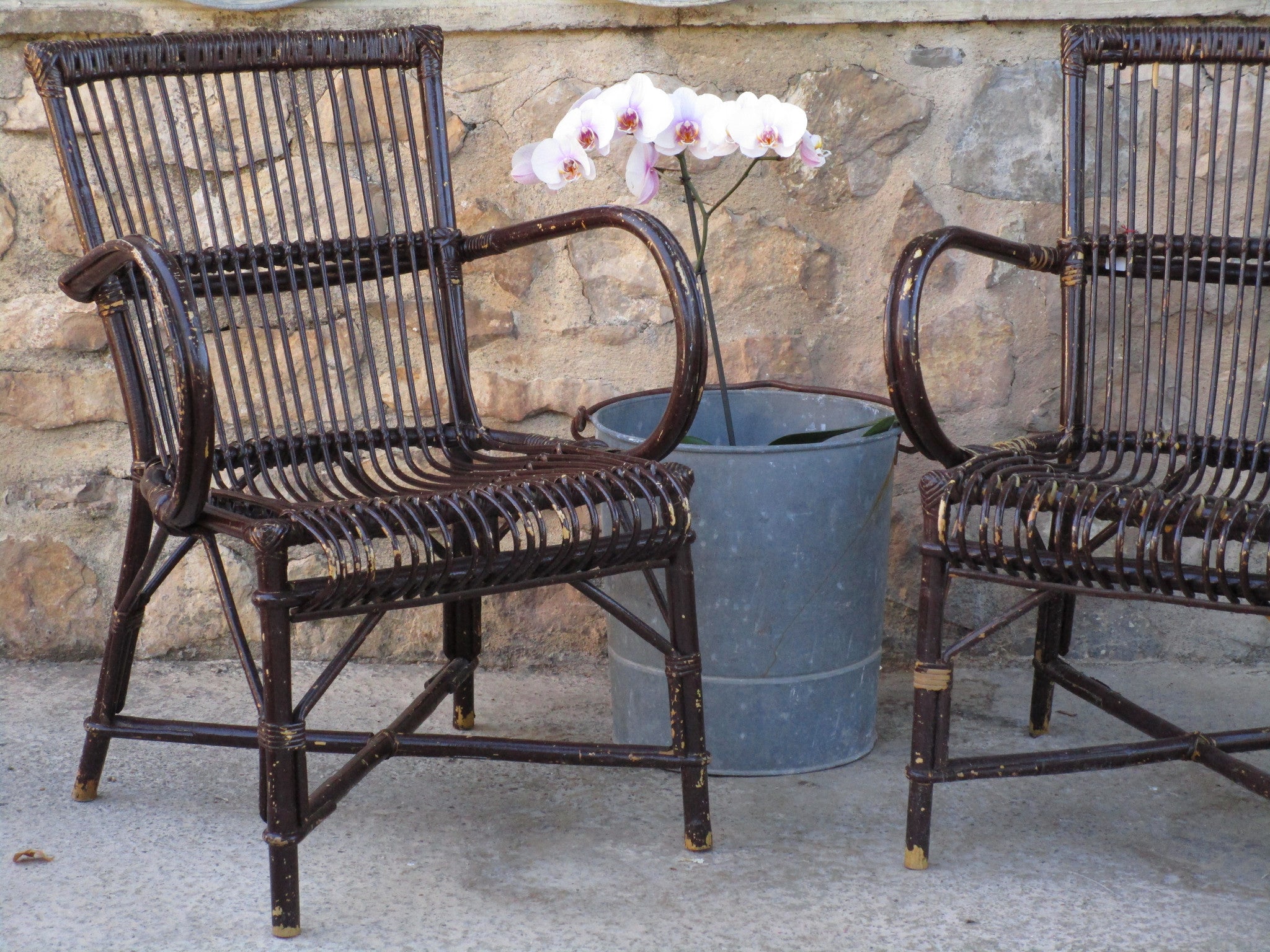 Pair of mid-century French rattan armchairs