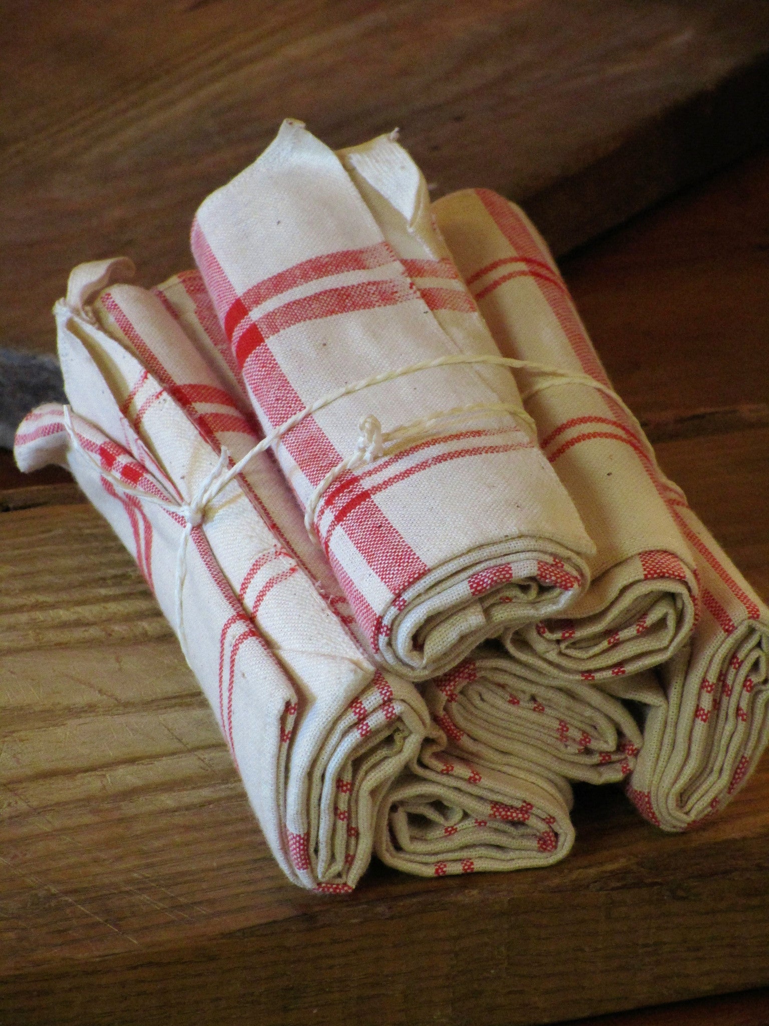 Set of six red checked tea towels