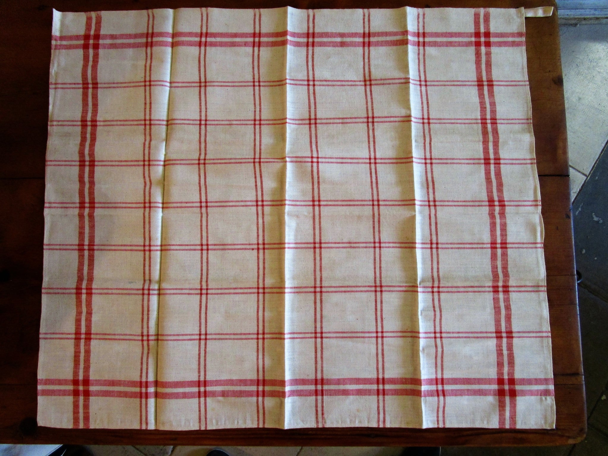 Set of six red checked tea towels