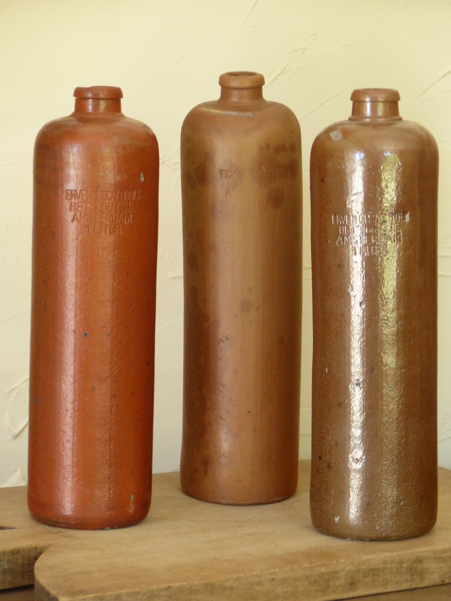 Vintage stoneware liqueur bottles