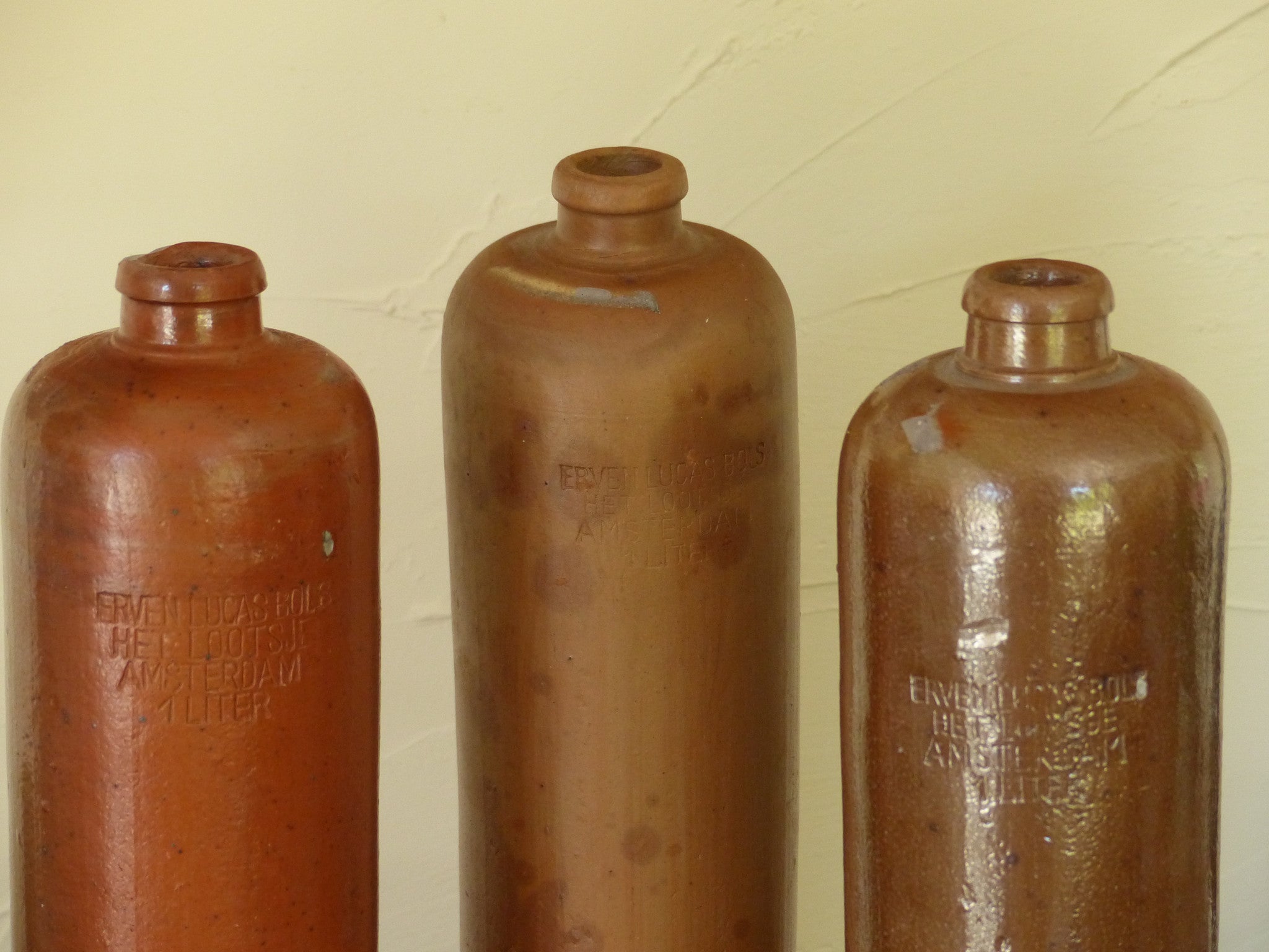 Vintage stoneware liqueur bottles