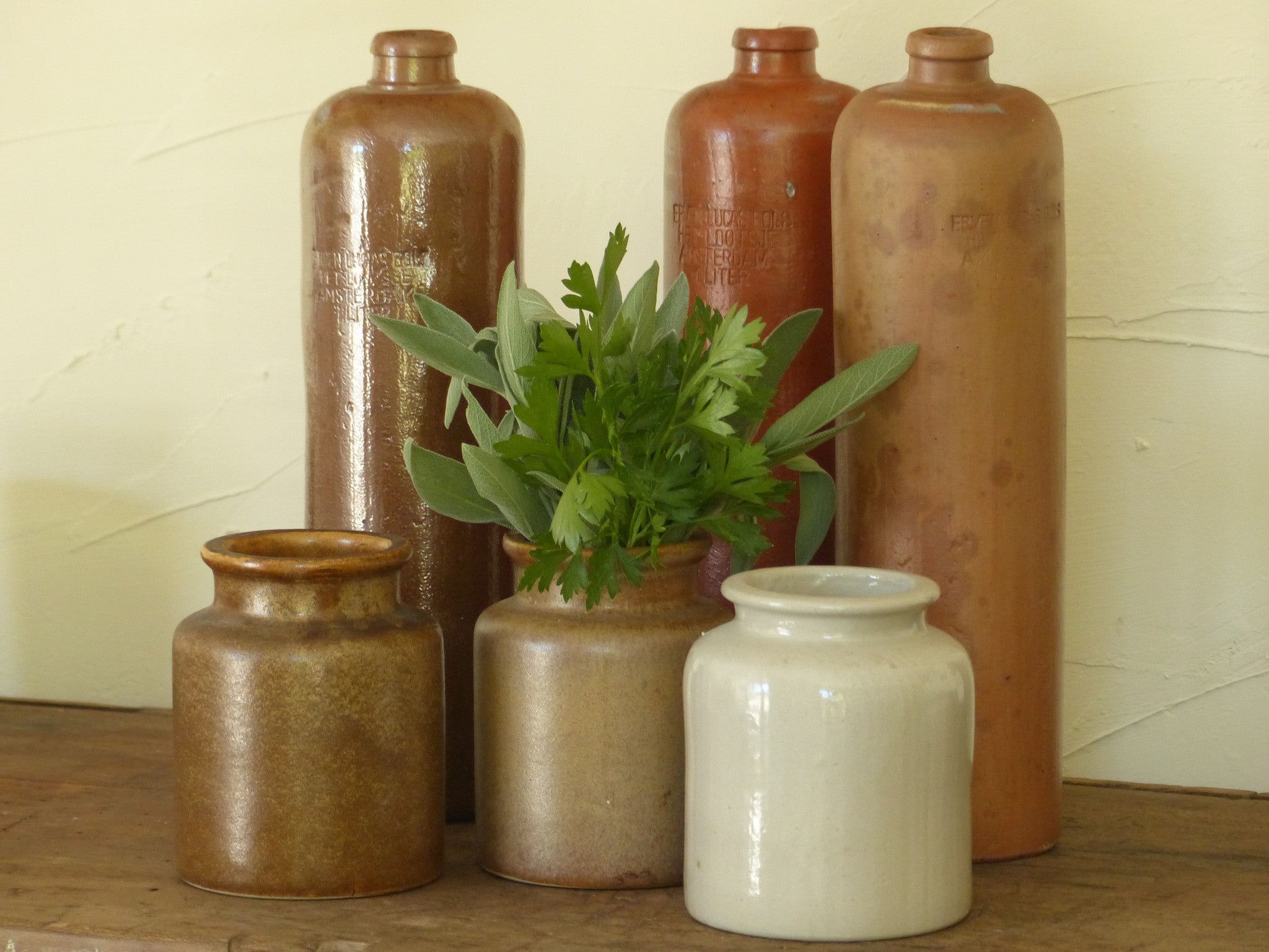 Vintage stoneware liqueur bottles