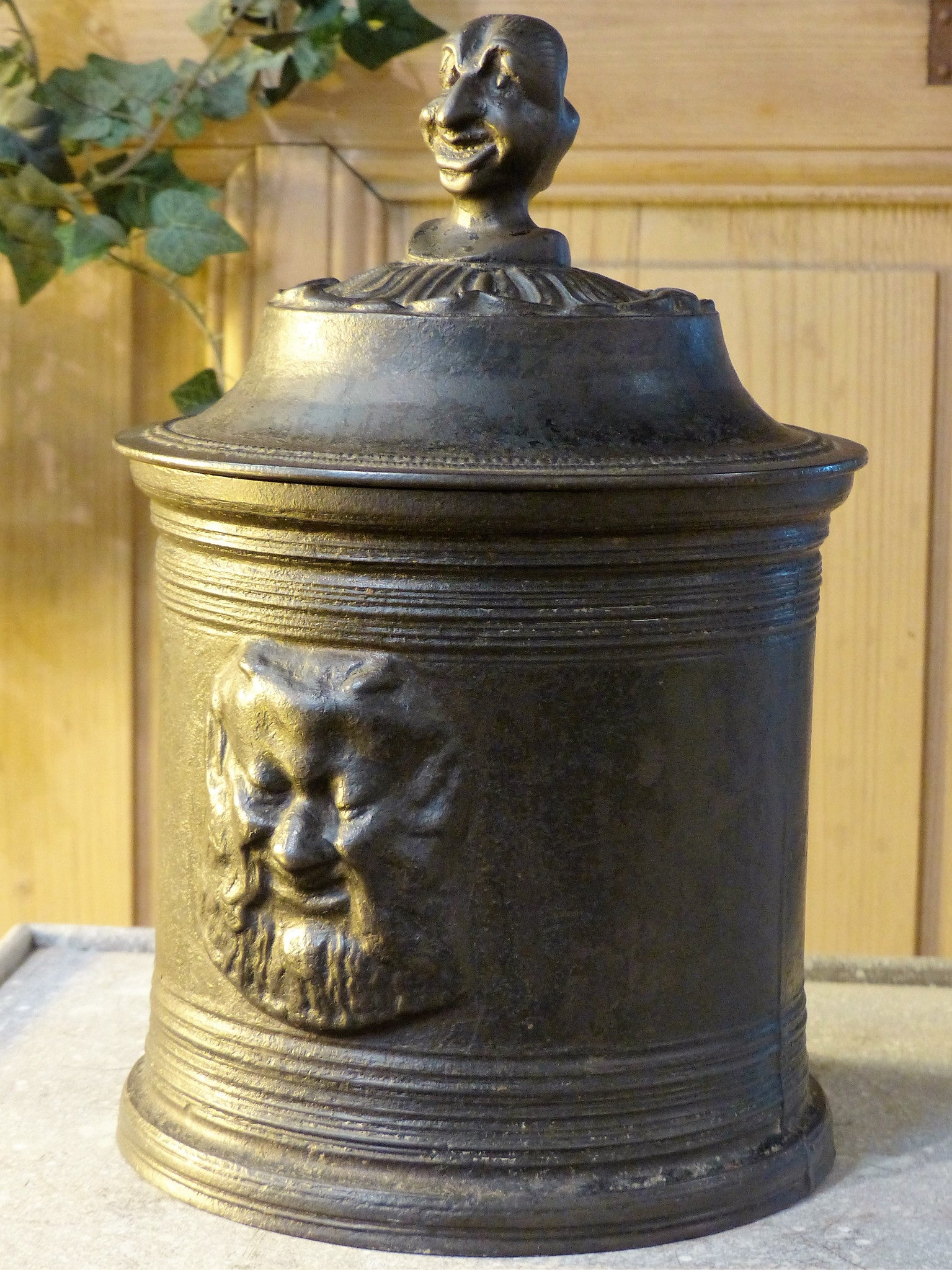 19th century tobacco container in enamelled cast iron