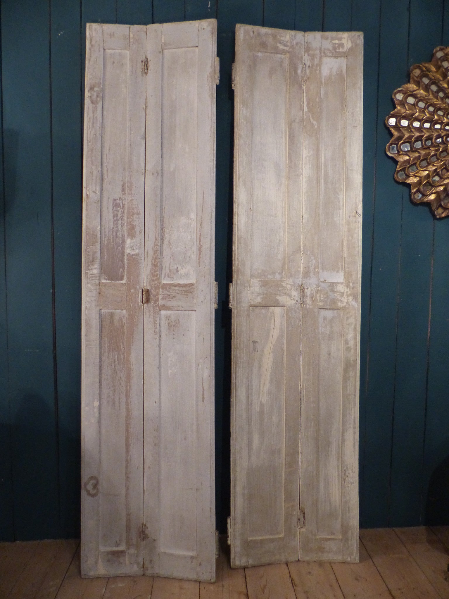 Pair of 19th century shutters with white patina