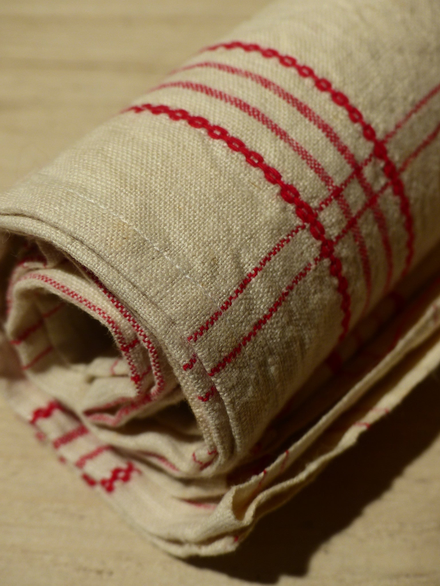 Pair of red and cream tea towels