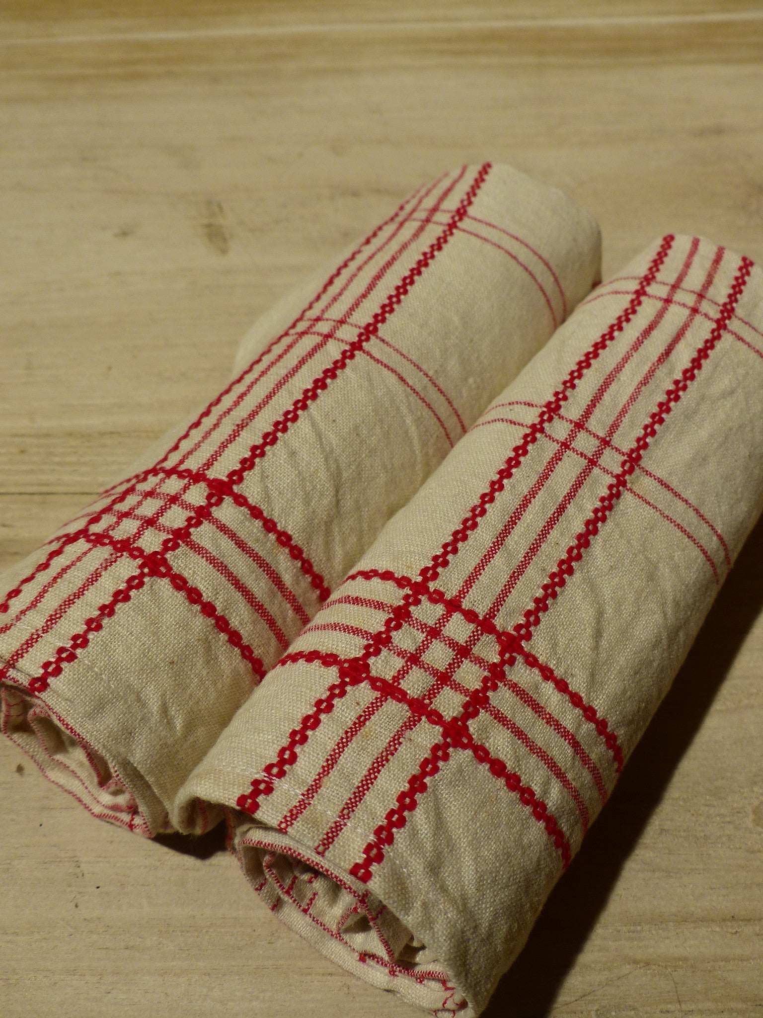 Pair of red and cream tea towels