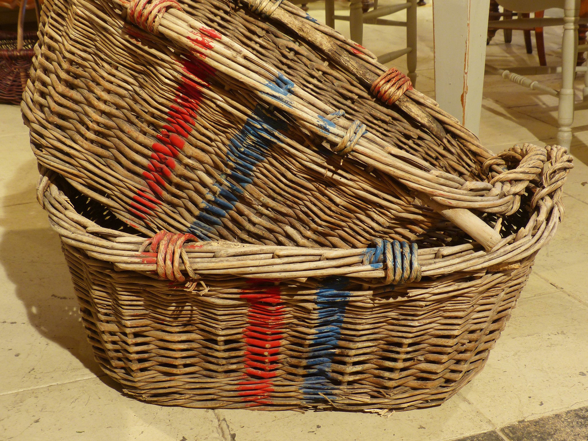 Large French wicker basket with red and blue