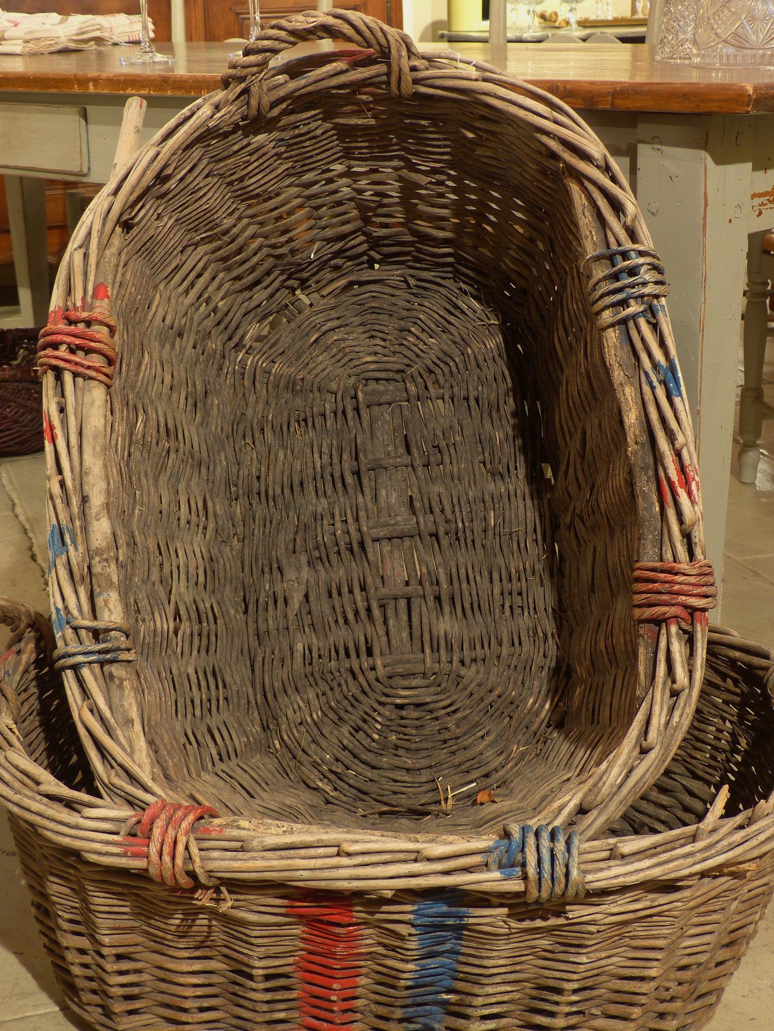 Large French wicker basket with red and blue