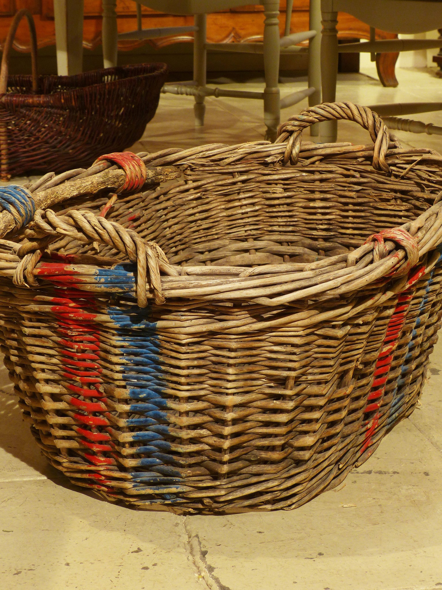 Large French wicker basket with red and blue