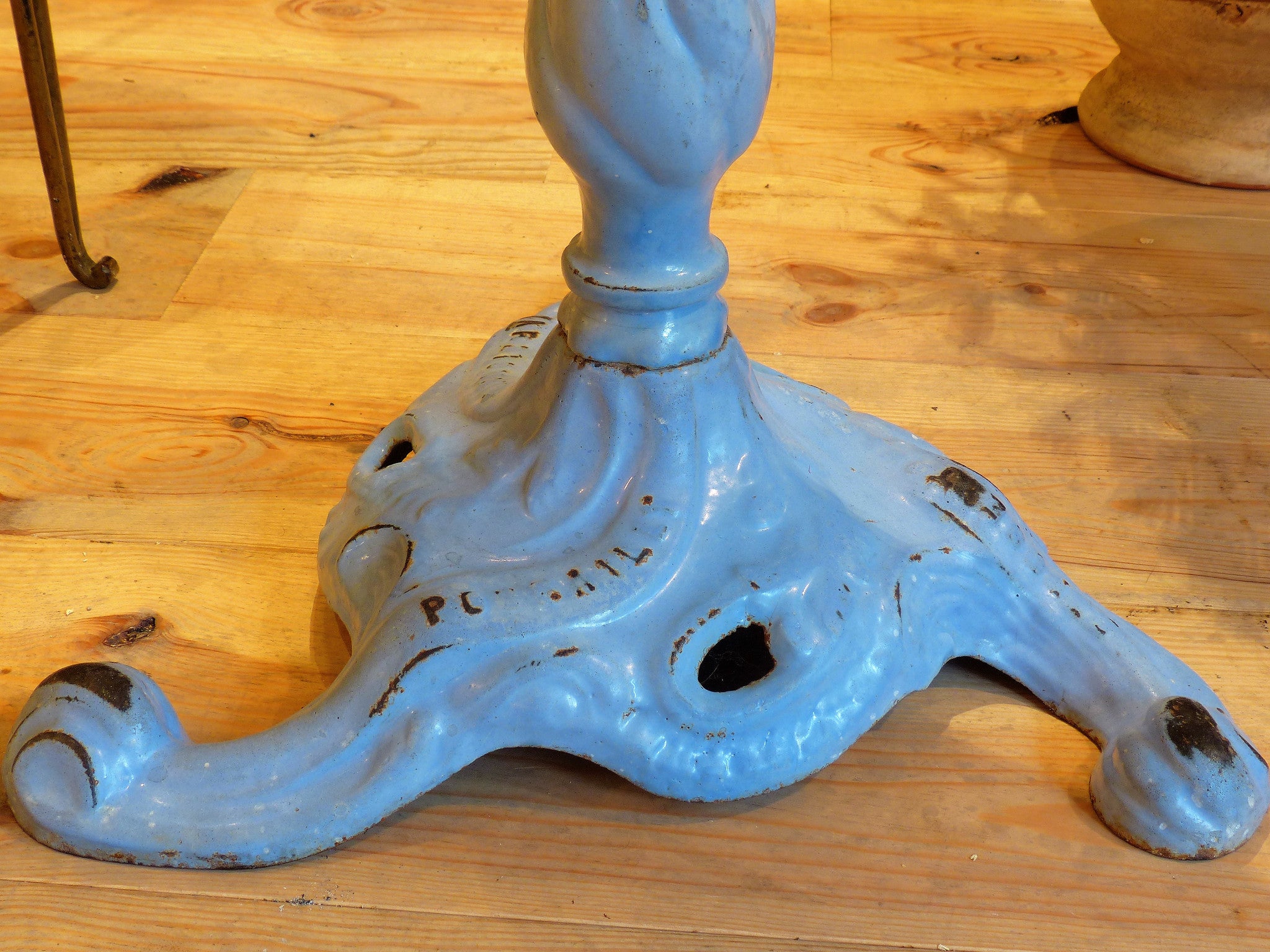 Bistro table, black marble top with blue stand