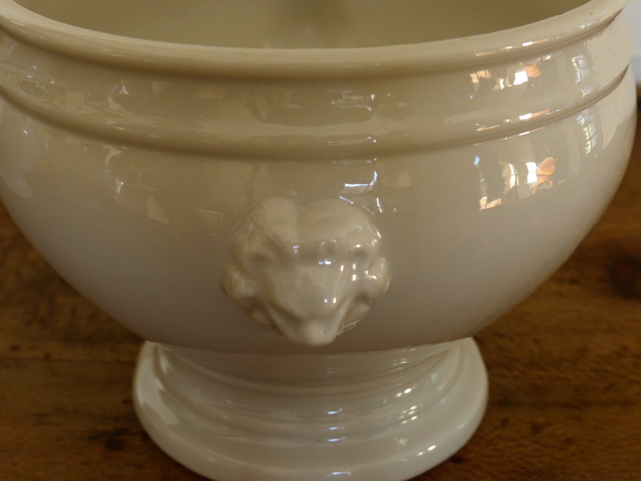 Set of four French lion head soup bowls