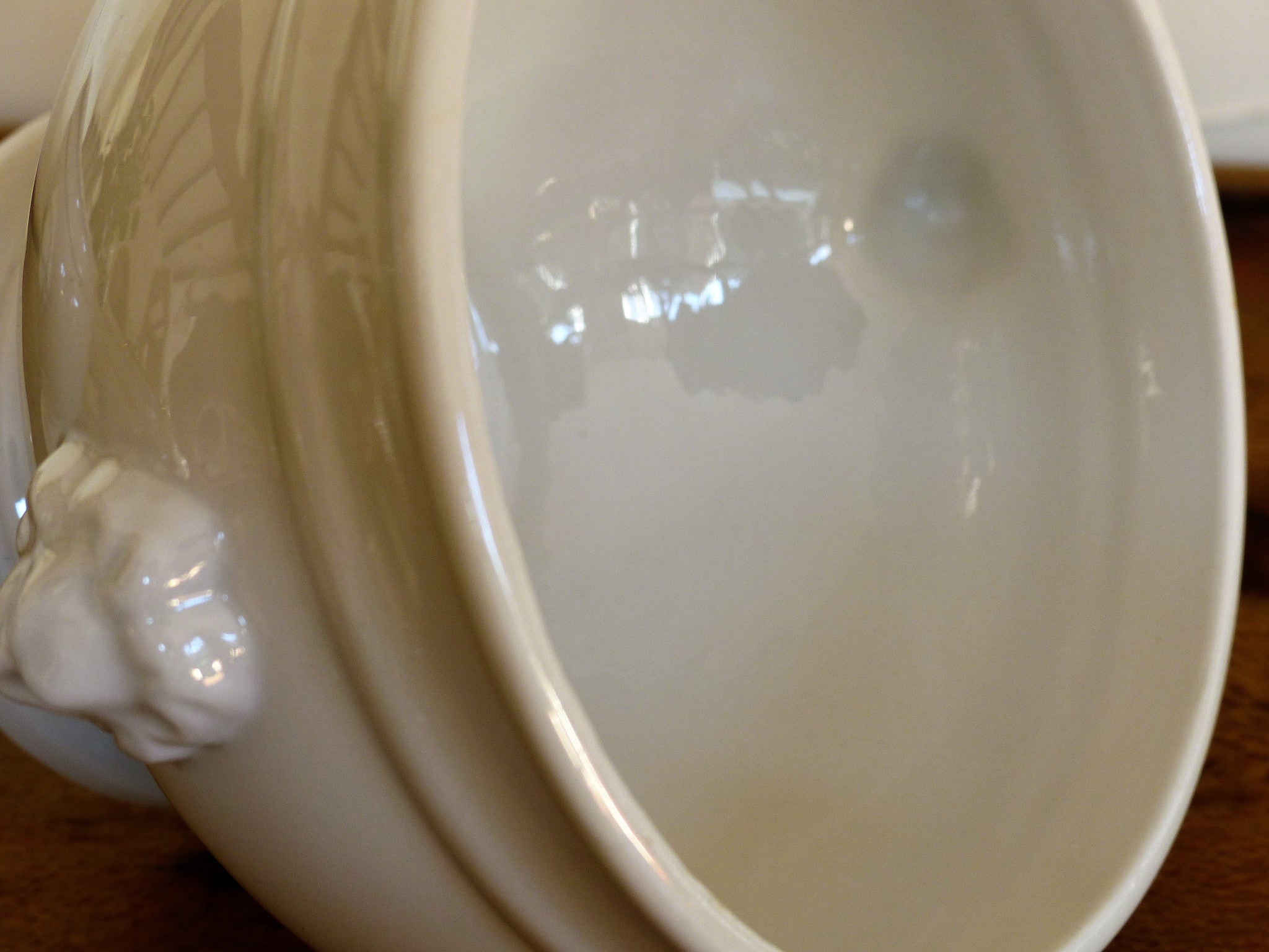 Set of four French lion head soup bowls