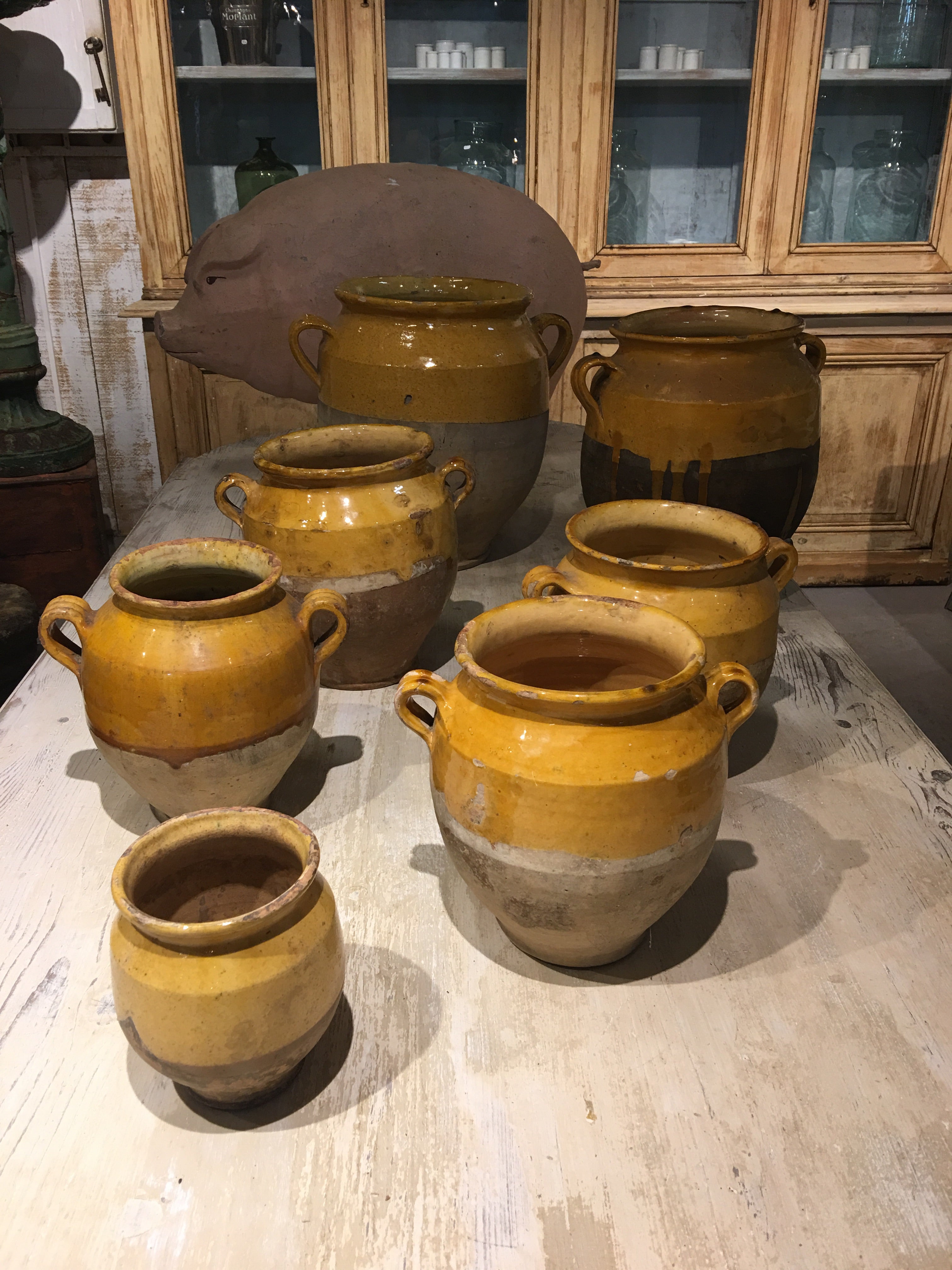 Collection of seven antique French confit pots