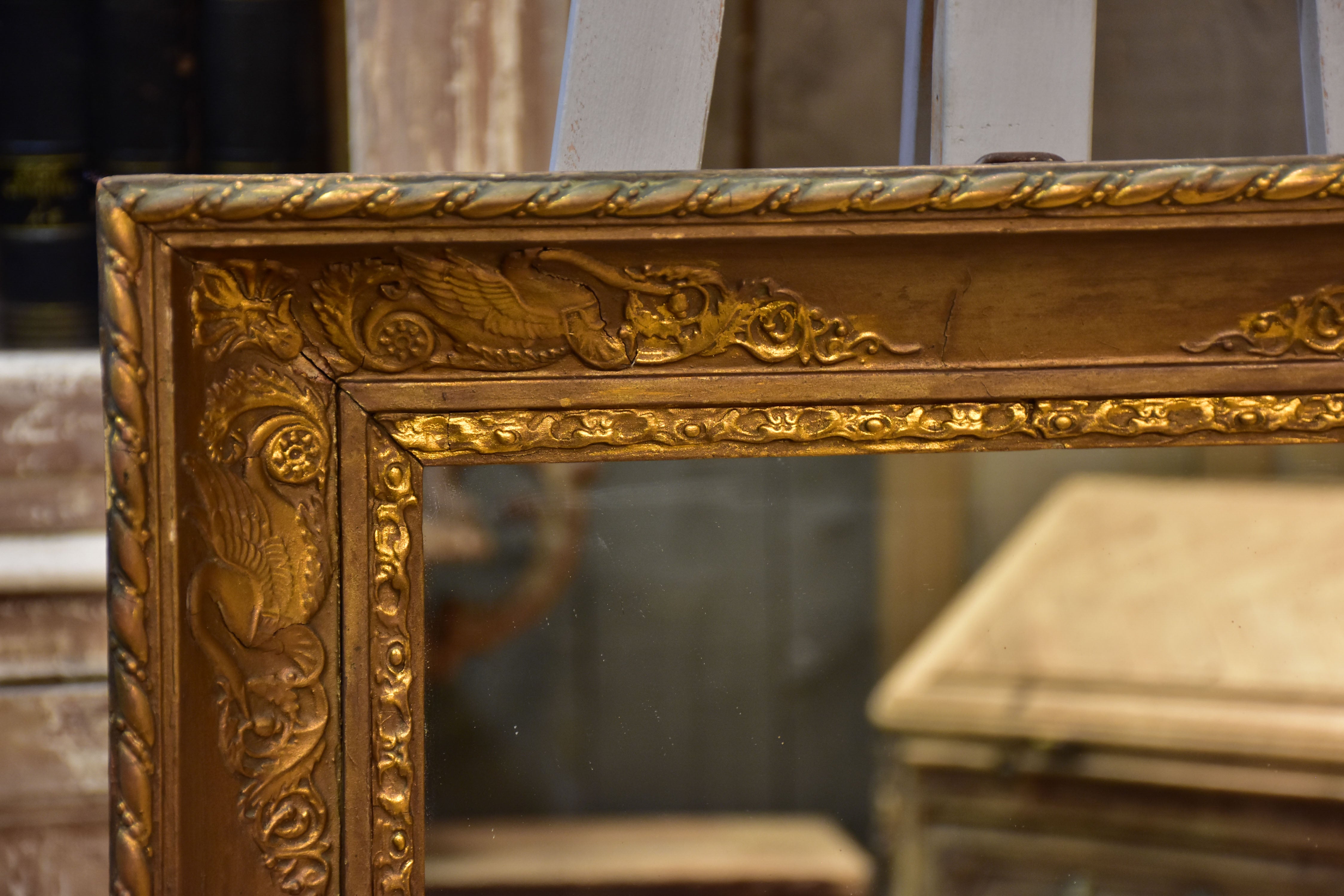 Small early 19th century Empire mirror with deep rectangular frame