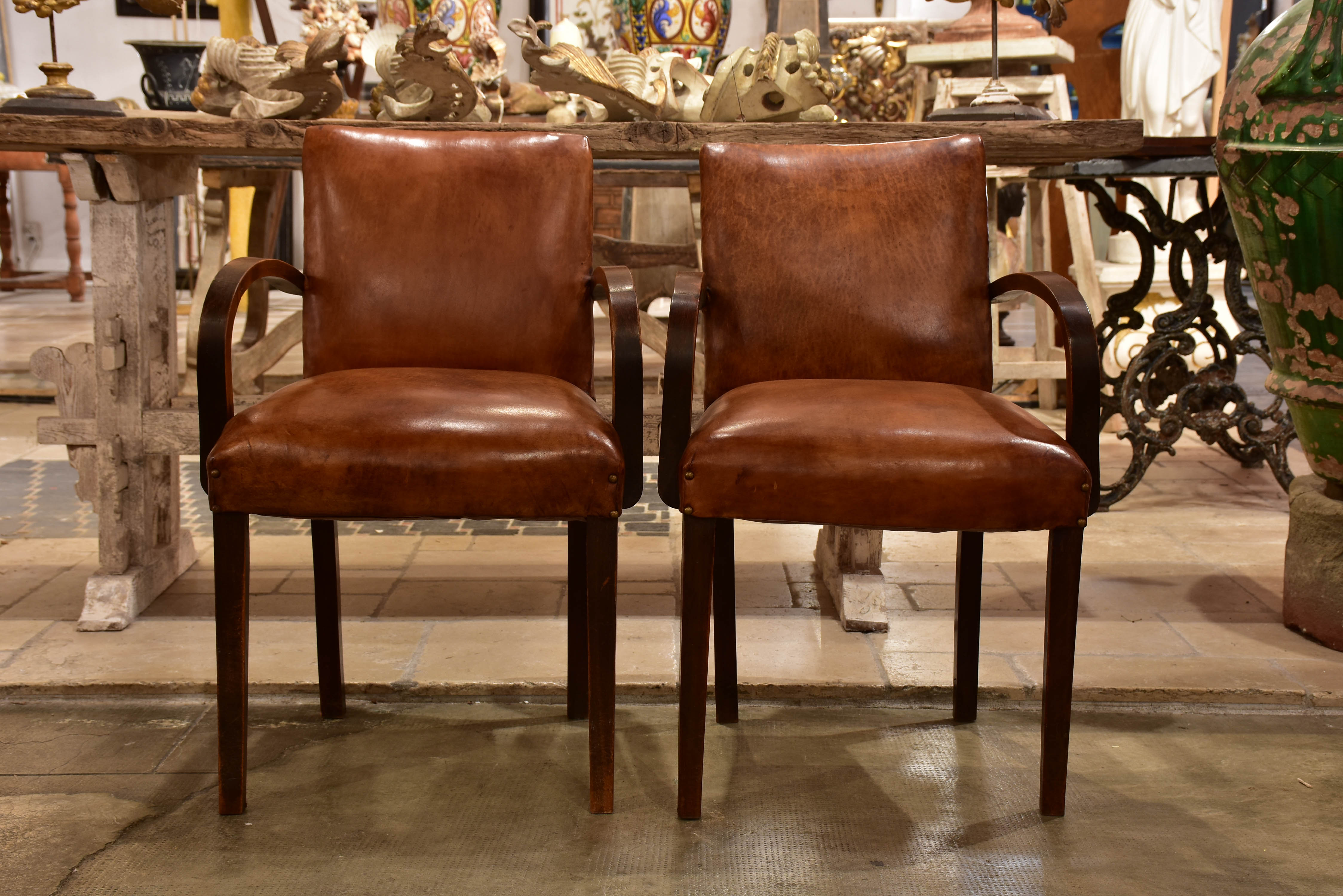 Pair of French Bridge armchairs with leather upholstery