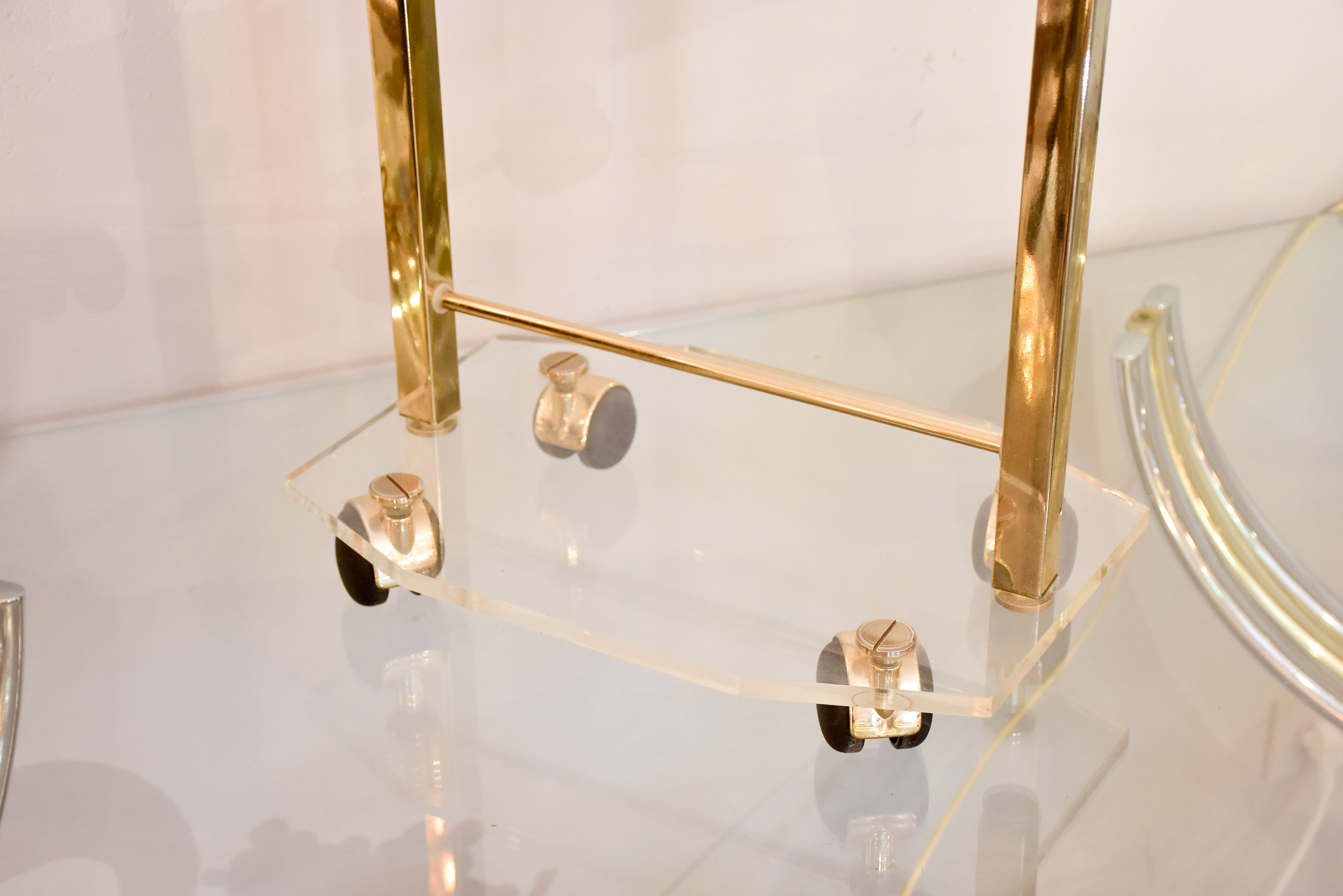 Vintage plexiglass valet stand on casters