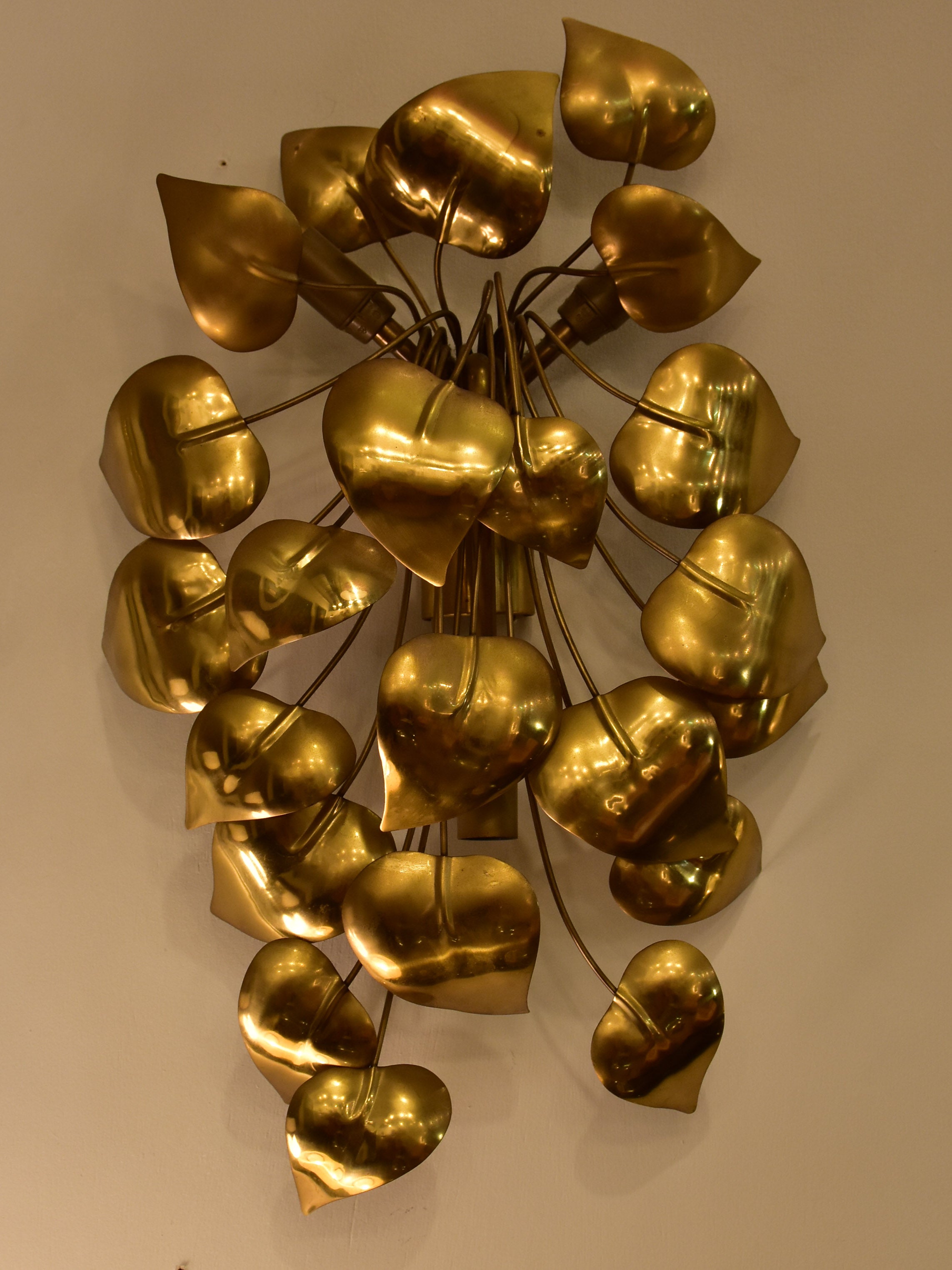 Sculptural vintage wall sconce with gold leaves