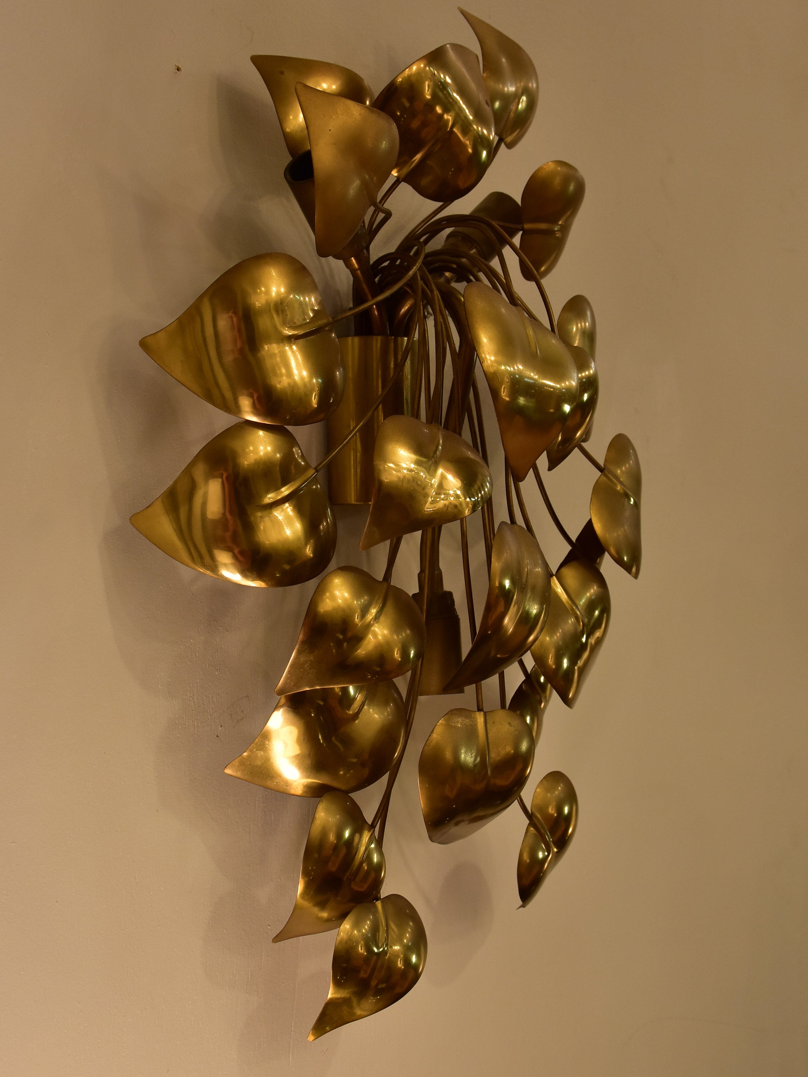 Sculptural vintage wall sconce with gold leaves