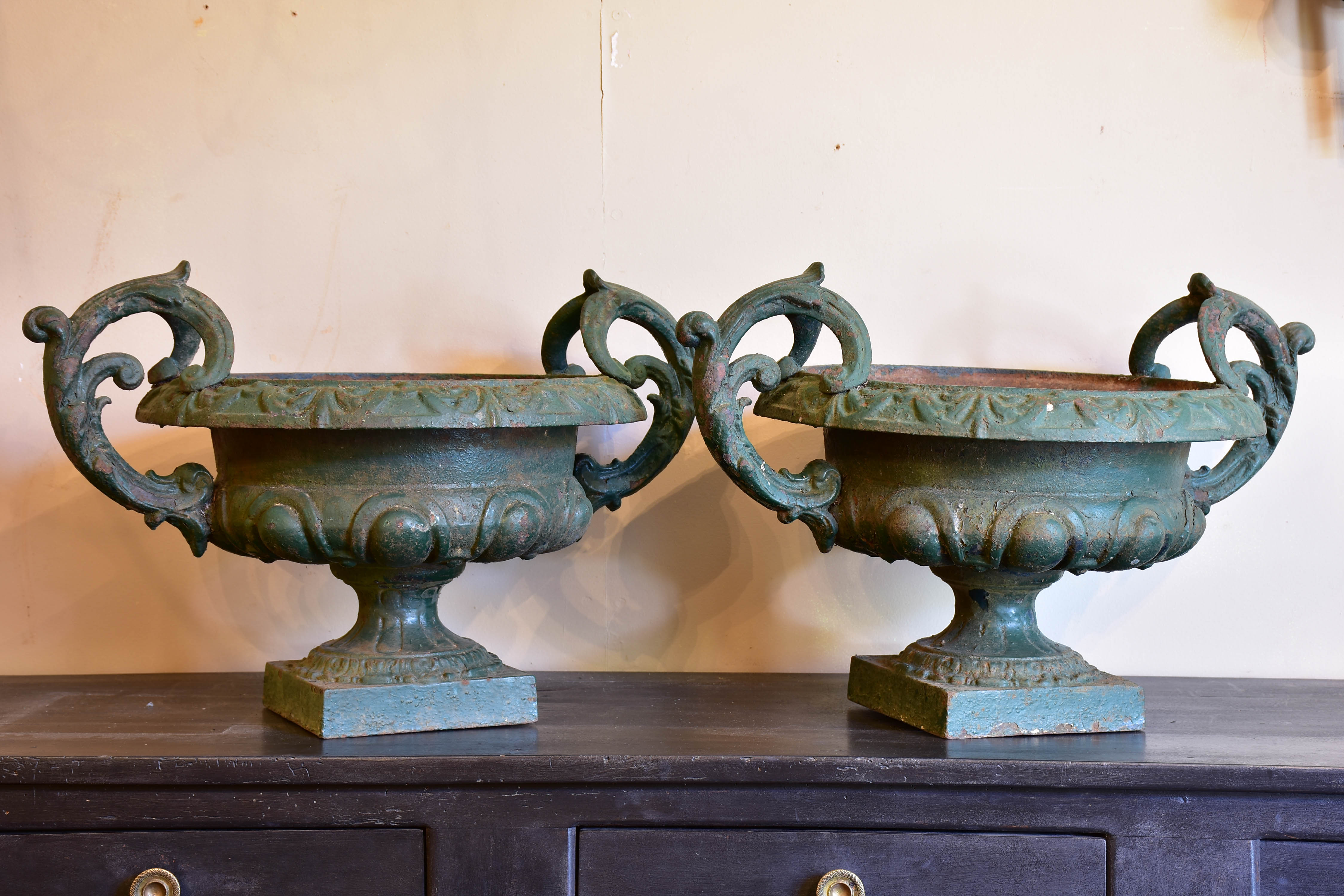 Pair of 19th century Medici urns with green finish