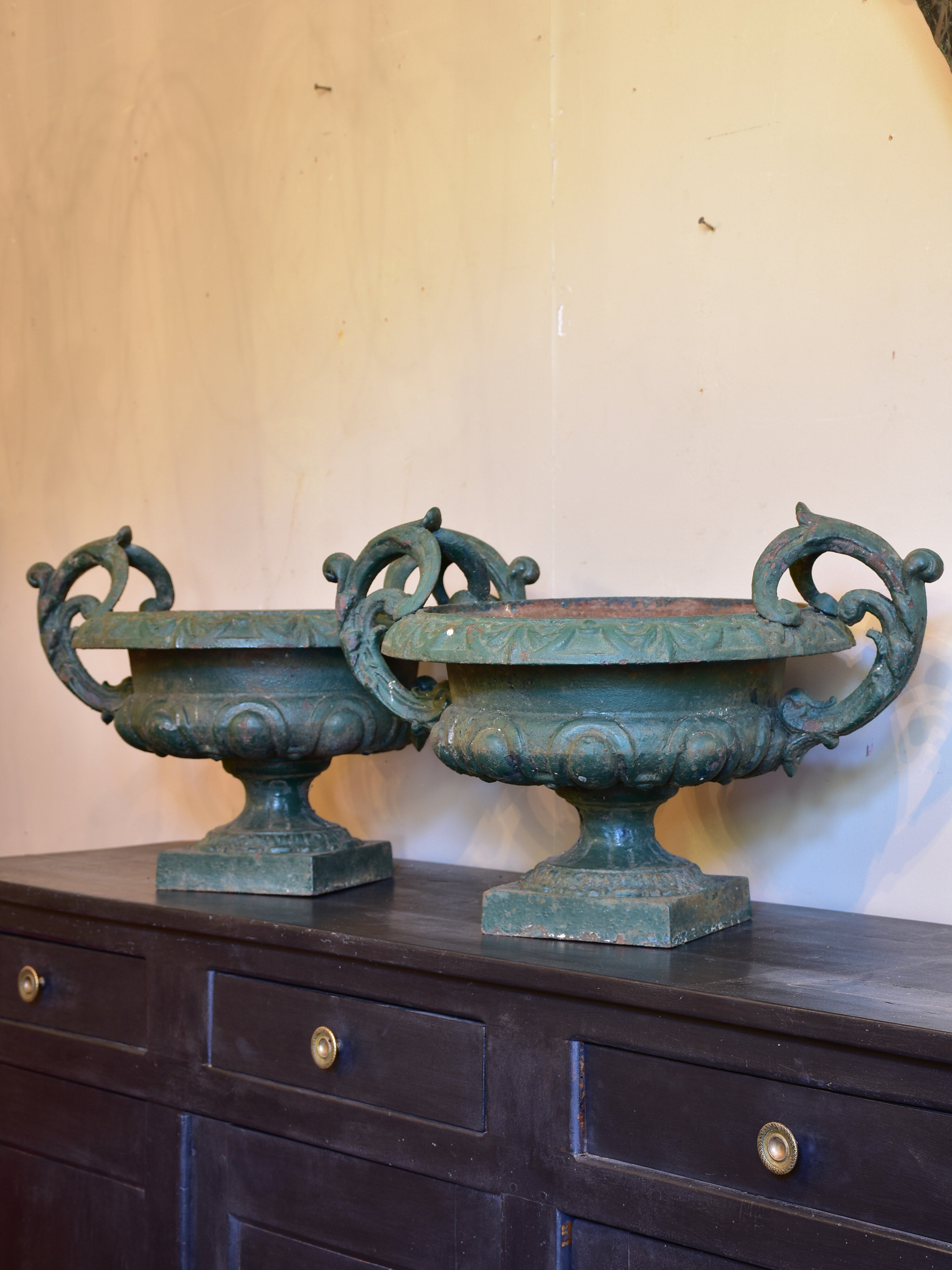 Pair of 19th century Medici urns with green finish