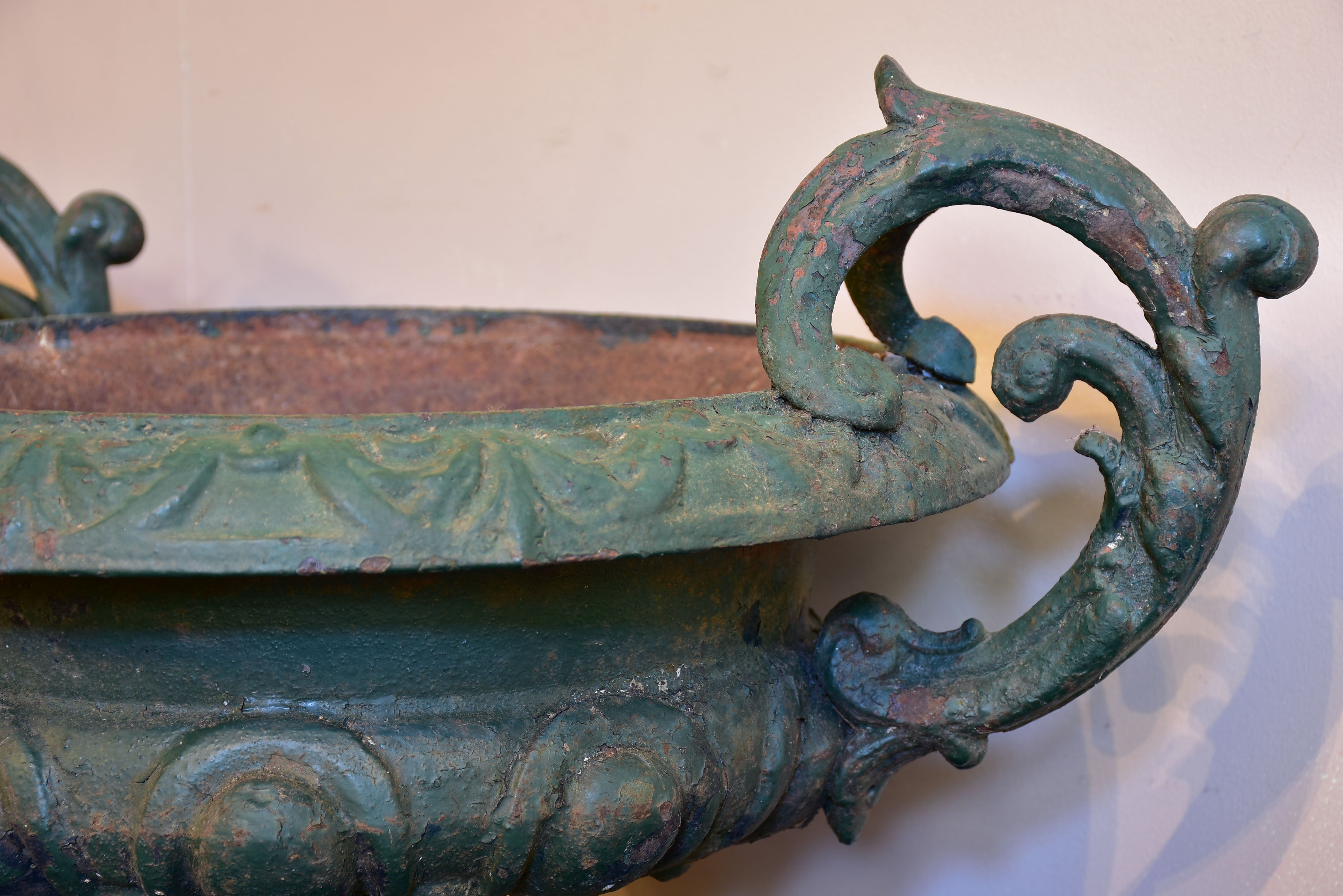 Pair of 19th century Medici urns with green finish