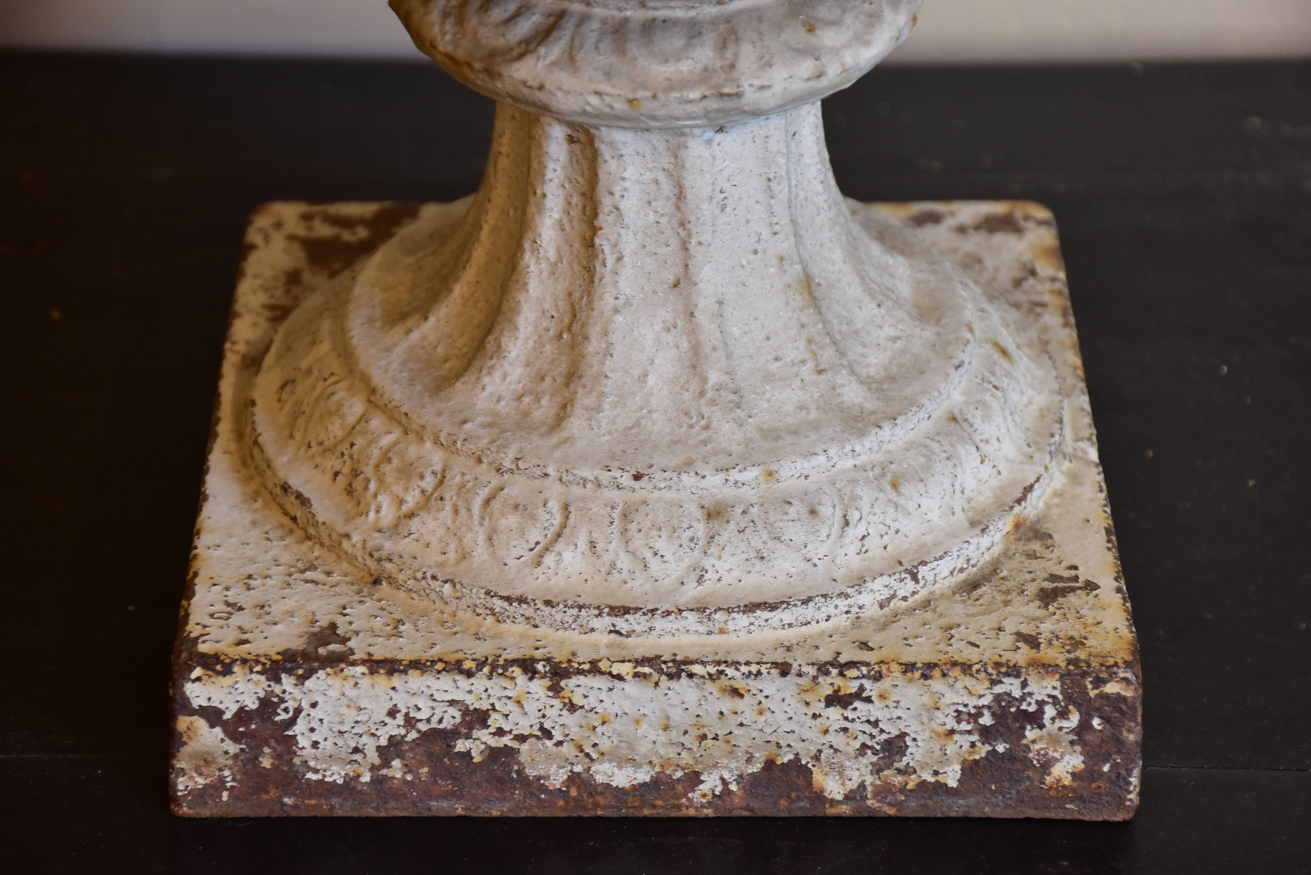 Antique French cast iron garden urn with angel faces